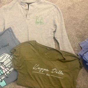 KD grey and green shirts